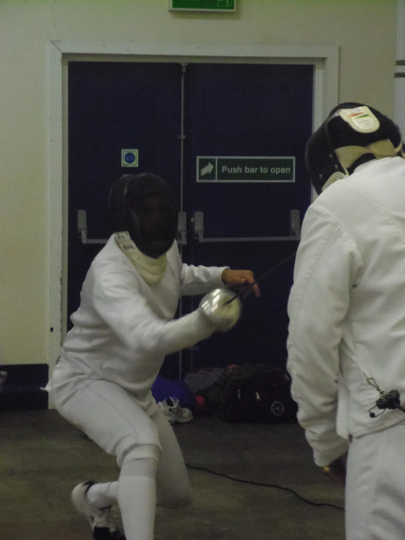 Two fencers practising at close quarters