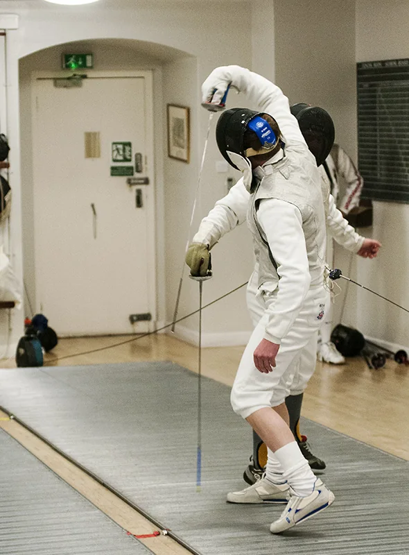 Two fencers practising at close distance