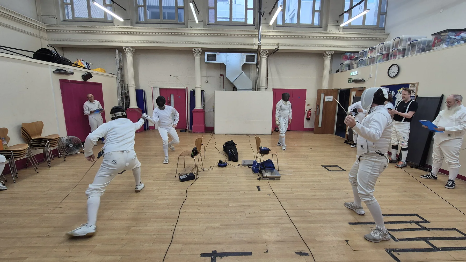 Club members fencing in the Waterloo practice hall